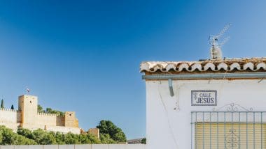 a building with a sign on the side Antequera